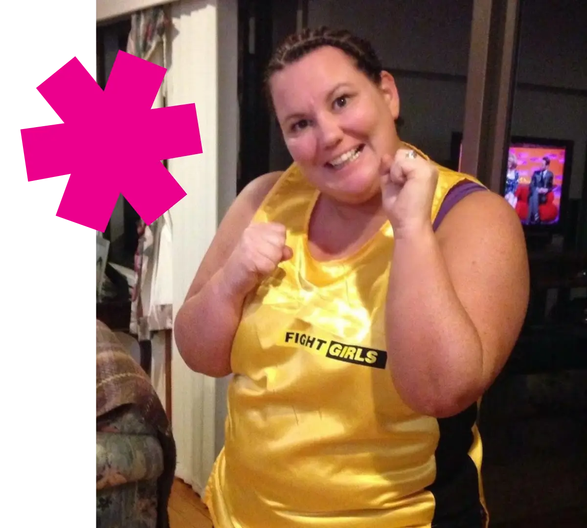 Pauline in a yellow "fight girls" uniform for charity